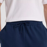 New Balance Sport Graphic Fleece Jogger M MP51940NNY kalhoty 2XL