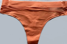 Dámská tanga Calvin Klein QF6047E meruňková