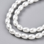 Voskované perly ve tvaru rýže - bílé - 4,5 x 6 mm - 10 ks