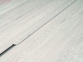 GEOMAT Podlahový přechodový profil – SPC RIGID T-LINE Toronto EF system, d. 1,2 m; š. 35 mm