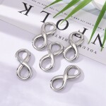 Spojovací mezidíl z nerezové oceli - velký - nekonečno - platinový - 39 x 17 x 3 mm - 1 ks