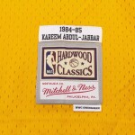 Mitchell & Ness Pánský dres Los Angeles Lakers NBA Kareem Abdul-Jabbar #33 1984-85 Swingman Velikost: L
