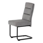 Židle jídelní, taštičkové pružiny v sedáku, madlo na opěráku, světle šedá látka, černý kov