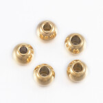 Korálek z nerezové oceli - zlatý - 4 x 3 mm - 1 ks