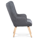 Křeslo "ušák" s podnožkou, potah šedá látka, dřevěné nohy, masiv kaučukovník