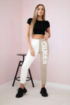 Dámské tepláky s nápisem QUEEN béžový UNI