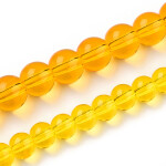Skleněné korálky - průsvitné - žluté - ∅ 6 mm - 10 ks