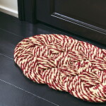 HAY Rohožka Coco Swirl Bordeaux/Off-white 40 × 80 cm, červená barva