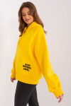 Žlutá zateplená oversize mikina kapucí nápisem