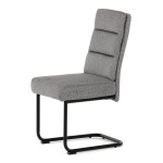 Židle jídelní, taštičkové pružiny v sedáku, madlo na opěráku, světle šedá látka, černý kov