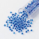 Skleněný rokajl - 11/0 - 2,3 x 1,5 mm - průhledný s tmavě modrým středem - třída A -1 g