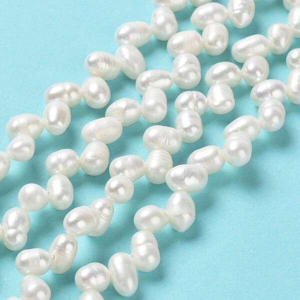 Přírodní sladkovodní perla - bílá - třída AAA - 7~8 x 5~6 mm - 1 ks