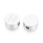 Korálek z nerezové oceli - placička s písmenem - různé varianty - 10 x 4,5 mm - 1 ks Písmena: E