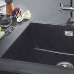 GROHE - Dřezy Kompozitní dřez K700 s odtokem, 61x46 cm, granitová černá 31655AP0