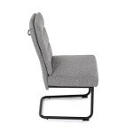 Židle jídelní, taštičkové pružiny v sedáku, madlo na opěráku, světle šedá látka, černý kov