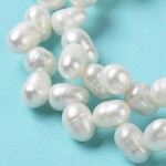 Přírodní sladkovodní perla - bílá - třída AAA - 7~8 x 5~6 mm - 1 ks