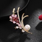 Květinová brož se Swarovski Elements krystaly a bílou perlou, Zlatá