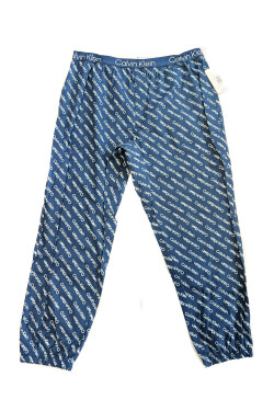 Pánské kalhoty na spaní NM2182E 1MO modré Calvin Klein modrá potiskem