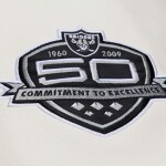Mitchell & Ness Pánská bunda Oakland Raiders NFL Dusted Varsity Créme Velikost: M