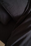 Storefactory Povlečení z organické bavlny Crinkle Phantom Black 150 × 210 cm, černá barva, textil