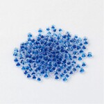 Skleněný rokajl - 11/0 - 2,3 x 1,5 mm - průhledný s tmavě modrým středem - třída A -1 g