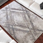 DumDekorace Béžový koberec s moderním abstraktním vzorem Šířka: 160 cm | Délka: 220 cm