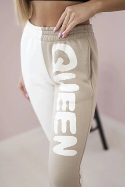 Dámské tepláky s nápisem QUEEN béžový UNI