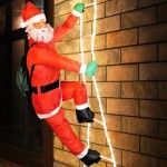 Iso Vánoční dekorace - Santa Claus na žebříku 49 LED