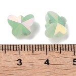 Skleněné korálky - broušený motýl - různé varianty - 10 x 8 x 6 mm - 1 ks Barva: Zelená
