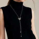 Dlouhý náhrdelník (sweater chain) Nevia - motýl, zirkony, Stříbrná 75 cm