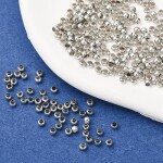 Zamačkávací rokajl - 2,0 mm x 1,2 mm - platinový - 1 g