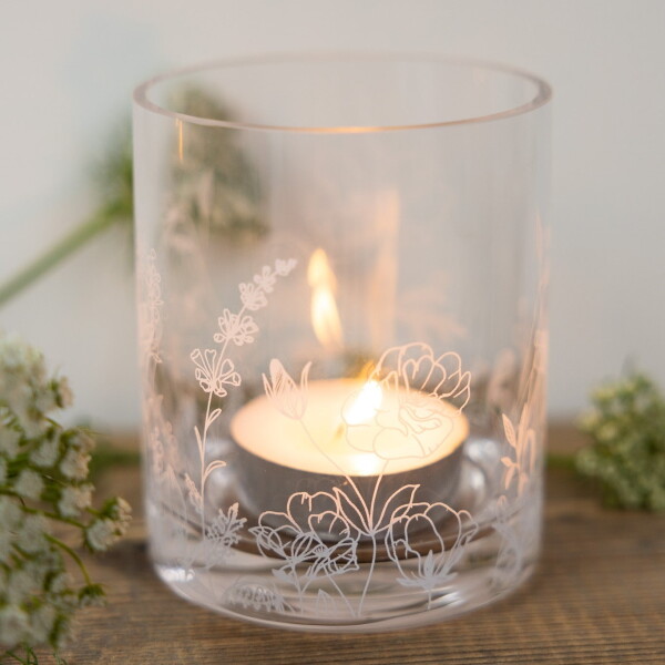Storefactory Skleněný svícen na čajovou svíčku Blomsteräng 12 cm, čirá barva