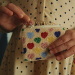 Konges Sløjd Dětská peněženka s korálky Hearts, krémová barva, textil
