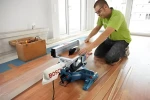 Bosch GTM 12 JL + GTA 2600 / Kombinovaná pokosová a stolní pila / 1800 W / kotouč 305 mm / laser (0615990EU2)