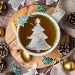TEA HERITAGE Zelený čaj s lískovými oříšky Christmas Tree – 5 ks, zelená barva