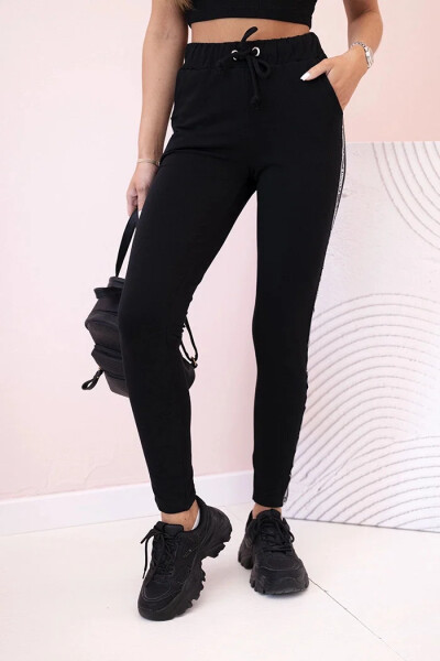 Dámské teplákové kalhoty s lampasem a šňůrkou v pase černé UNI