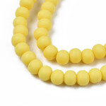 Korálky z polymeru - 7 mm x 5,5 mm - žluté - 10ks