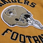 Mitchell & Ness Pánská bunda Oakland Raiders NFL Dusted Varsity Créme Velikost: M