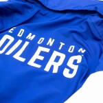 New Era Pánská bunda Edmonton Oilers NBA Quarter Zip Windbreaker Velikost: S