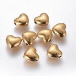 Korálek z nerezové oceli - zlatý - srdce - 9 x 10 x 4,5 mm - 1 ks