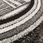 DumDekorace DumDekorace Originální šedohnědý koberec motivem abstraktních kruhů