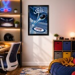 Sporticulture Fotografie Winnipeg Jets NHL Framed Hockey Puck Blast Art Print
