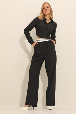 Trend Alaçatı Stili Dámské černé kalhoty s páskem, sklady, dvojitými kapsami a širokými nohavicemi Palazzo