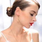 Náušnice Swarovski Elements Innocenti - hrdličky, Zlatá