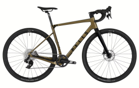 PELLS PELLS Raw Carbon 2 28", rám 21" (L), model 2025, barva Dijon Gold - ZDARMA dopravné, odborná montáž, seřízení a dárkový poukaz na nákup příslušenství! (Záruka nejlepší ceny! Nakupujte u autorizovaného prodejce!)