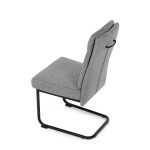 Židle jídelní, taštičkové pružiny v sedáku, madlo na opěráku, světle šedá látka, černý kov