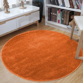 DumDekorace DumDekorace Okrúhly koberec oranžovej farbe