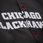 Mitchell & Ness Pánská bunda Chicago Blackhawks NHL Connor Bedard #98 Player Lightweight Satin Jacket Velikost: XL