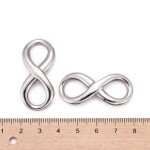 Spojovací mezidíl z nerezové oceli - velký - nekonečno - platinový - 39 x 17 x 3 mm - 1 ks