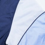 Mitchell & Ness Pánská bunda North Carolina Tar Heels NCAA Highlight Reel Windbreaker Velikost: S